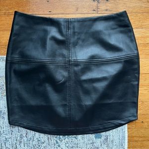 Black faux leather mini skirt
